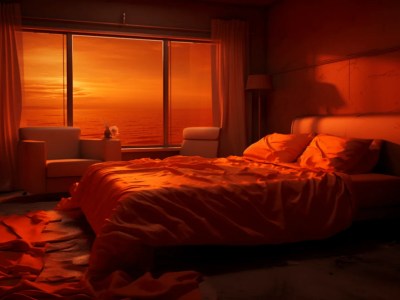 Bed Made With An Orange Blanket