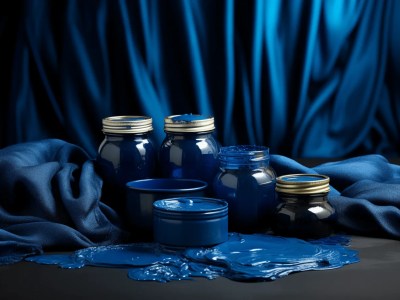 Blue Paint Set In Jars On Blue Cloth Background And A Blue Fabric