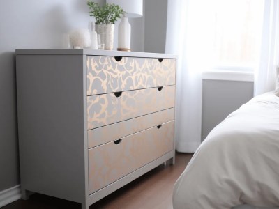 Gold And Silver Dresser In A Room