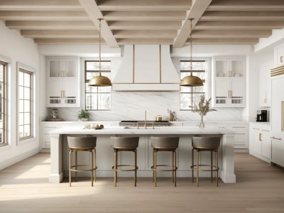 Gold Bar Stools And White Cabinets In A Large, White Kitchen