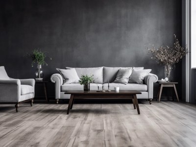 Gray Living Room With Furniture, Wood Floors, Paintings And A Black Wall And Gray Sofa