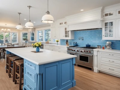 Kitchen With Several Islands, And Blue Trim